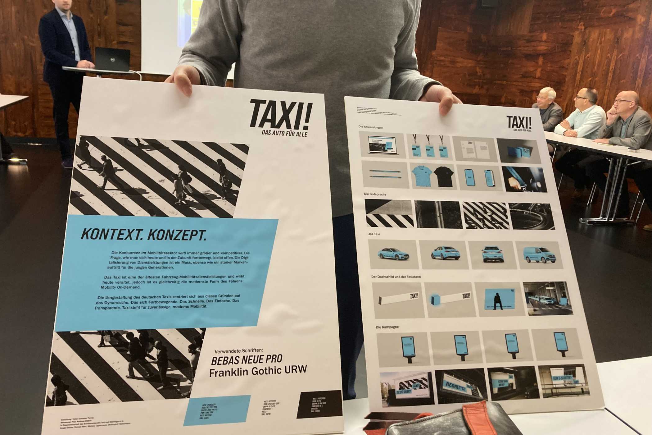 Roman Marx von Taxi Deutschland (links im Hintergrund) stellte verschiedene Entwürfe zu einem neuen Taxi-Erscheinungsbild vor, die aus einem Design-Wettbewerb hervorgegangen waren. (Foto: Thomas Kanzler)